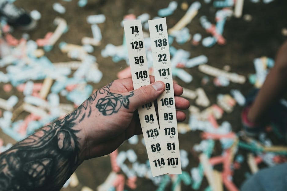 Lottery tickets fanned out on a wooden surface